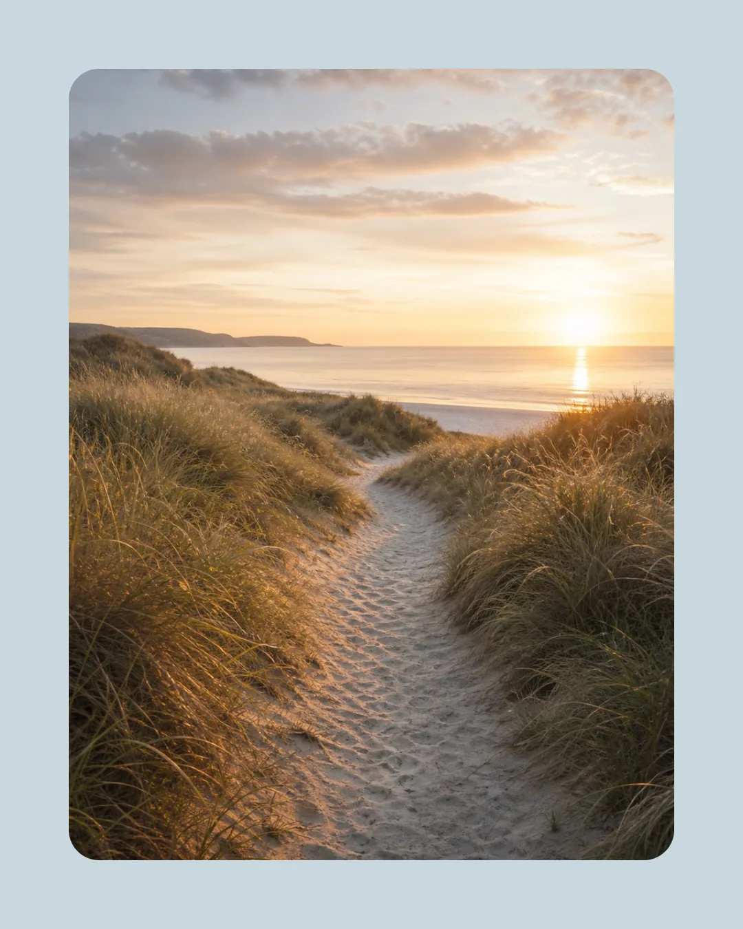Portrait coastal photo export with rounded corners and a blue background frame.